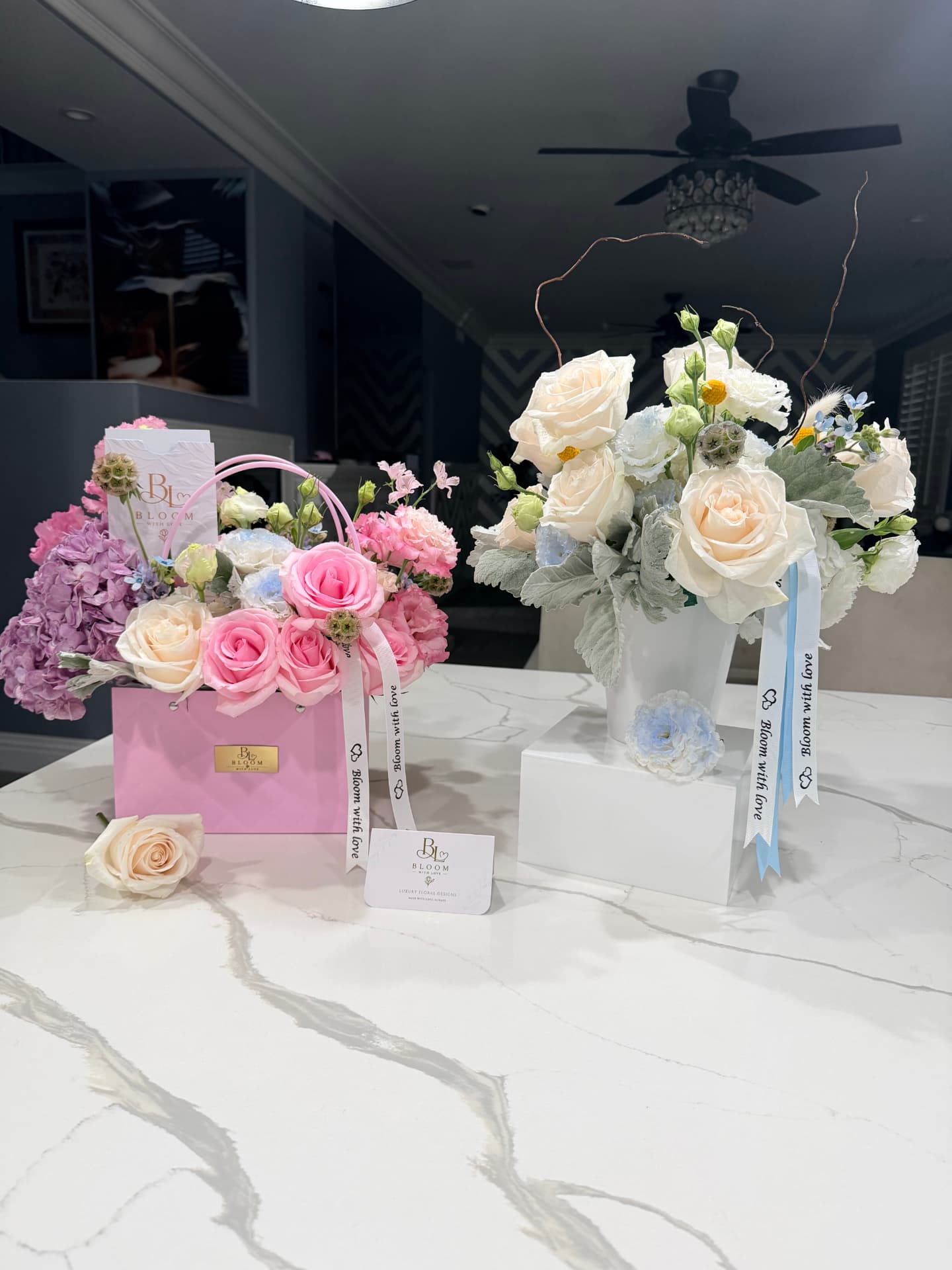 Welcome Baby garden-inspired arrangement available in Baby Girl pink and lavender tones or Baby Boy white and blue tones