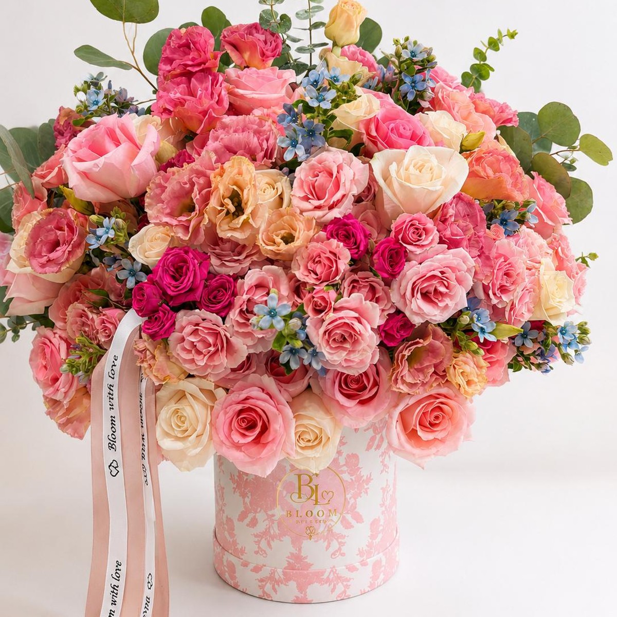 Bloom with Love Couture Box, an abundant designer's choice arrangement of premium seasonal blooms