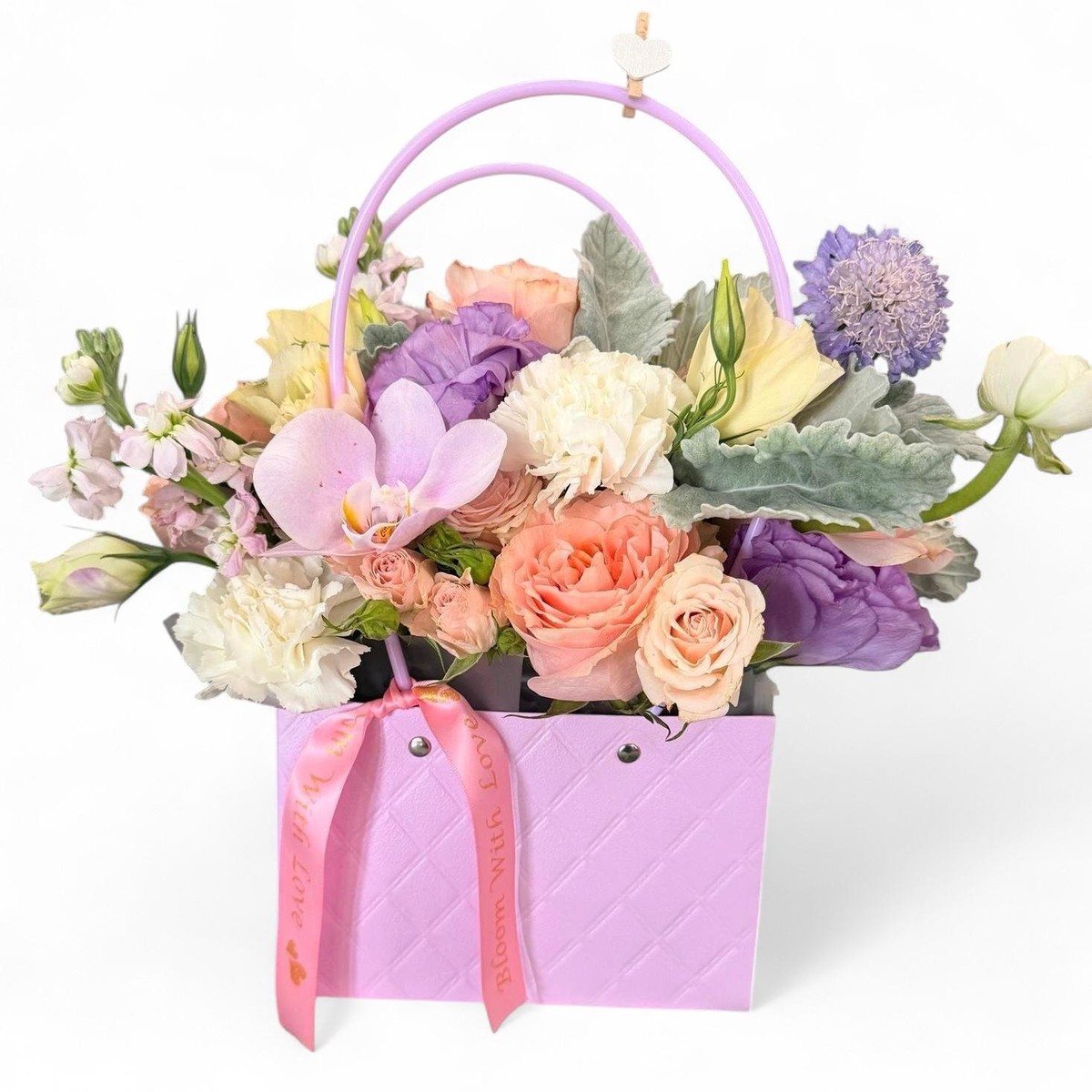Bloom with Love signature keepsake tote filled with premium seasonal blooms
